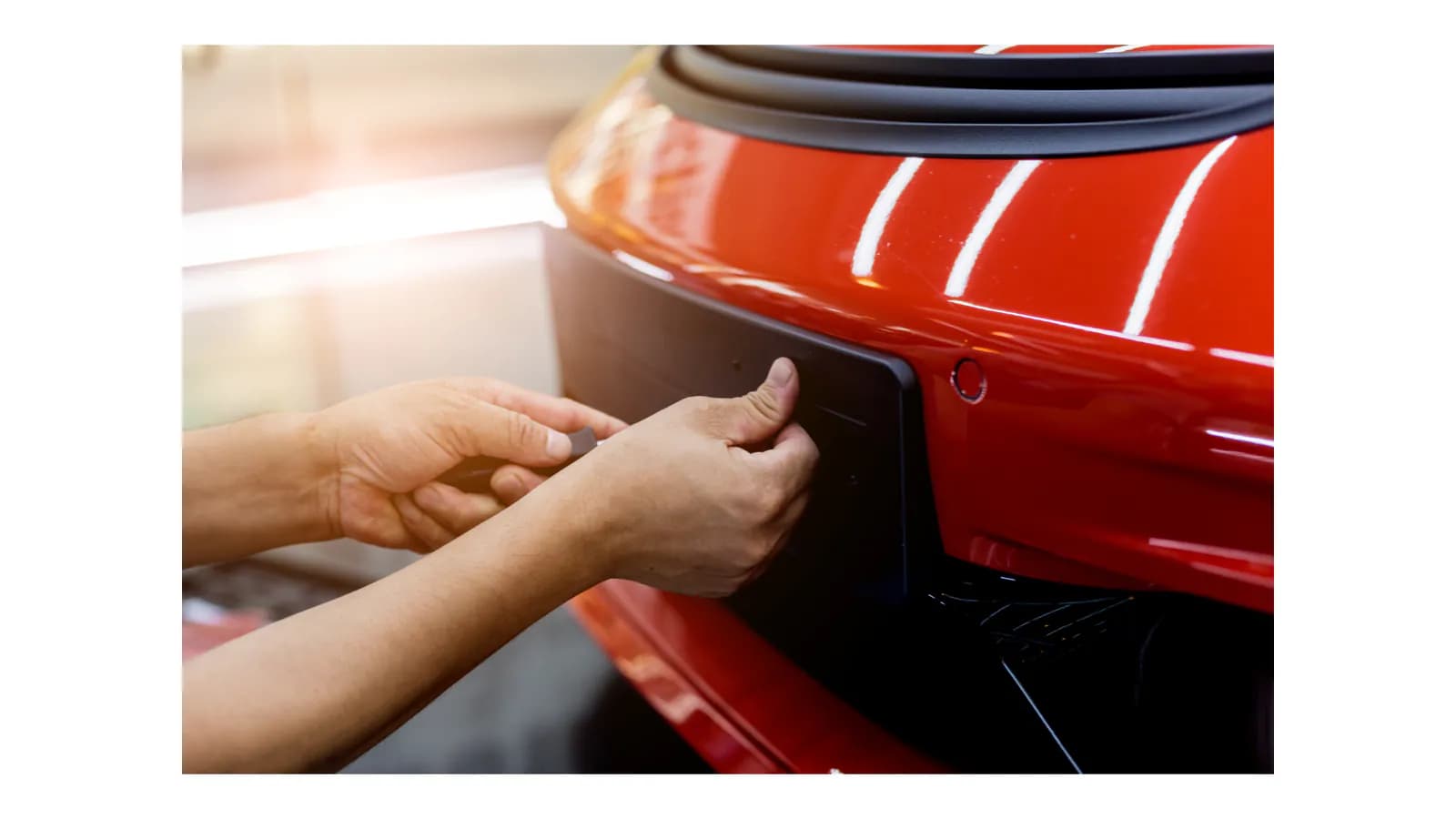 Oregon seller removing a rear license plate before a local junk-car buyer picks up the vehicle