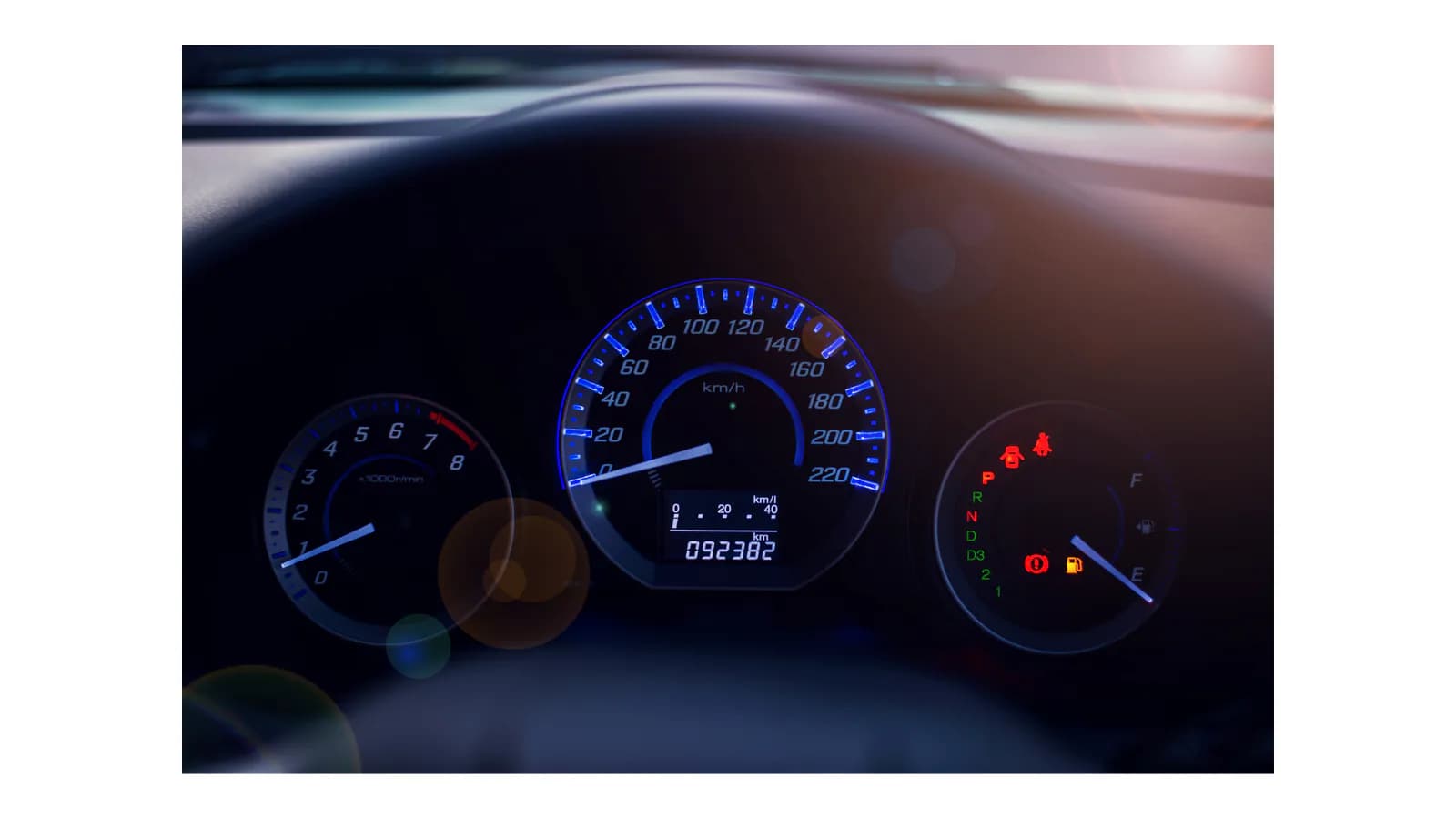 Vehicle dashboard mileage display being checked for an Oregon odometer disclosure before a junk-car sale