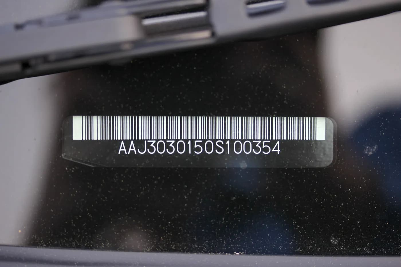 Dashboard vehicle identification number checked before an Oregon junk-car sale